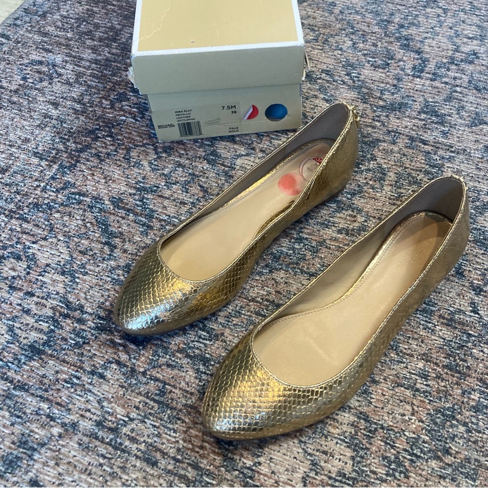 Michael Kors Mira Flat metallic gold tone leather